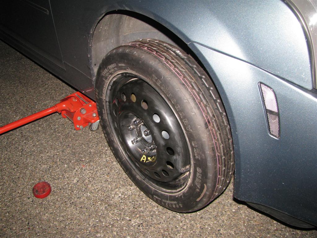 SRX 17x4" mini spare it fits!!! (With some work, of course)